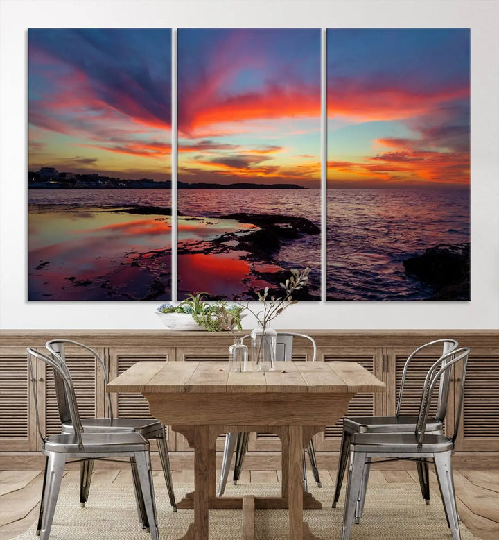 The Glorious Sunset on The Beach Wall Art Canvas Print features a vibrant sunset over rocky shores and is crafted on museum-quality canvas with a UV-protective coating.