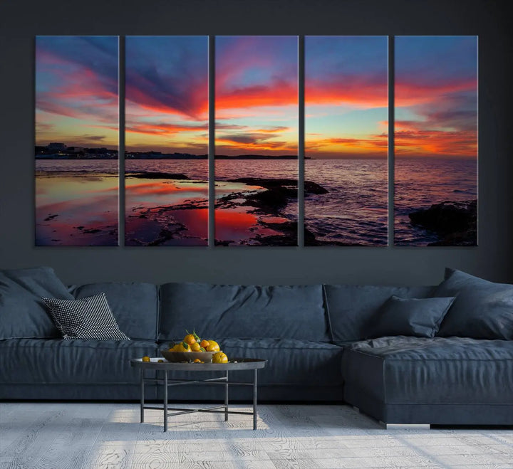 The Glorious Sunset on The Beach Wall Art Canvas Print features a vibrant sunset over rocky shores and is crafted on museum-quality canvas with a UV-protective coating.