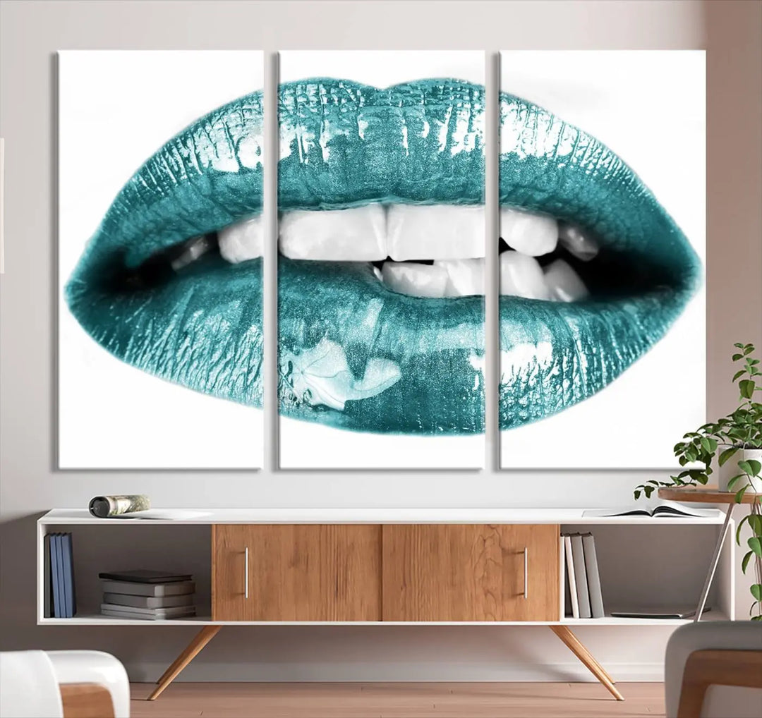 The "Glossy Lips Makeup Canvas Wall Art Print" in a striking teal hue graces the wall, adding a captivating touch of contemporary art to the space.