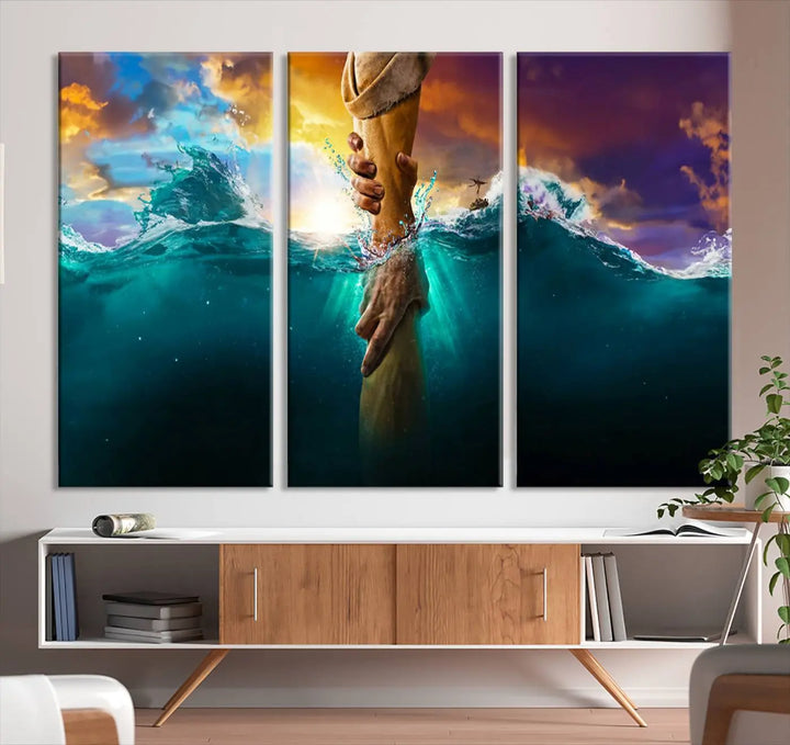 The God Hand Wall Art Canvas Print features a stunning three-panel design of hands reaching through ocean waves against a vibrant sky. The gallery-quality finish elevates this captivating wall art to a masterpiece.