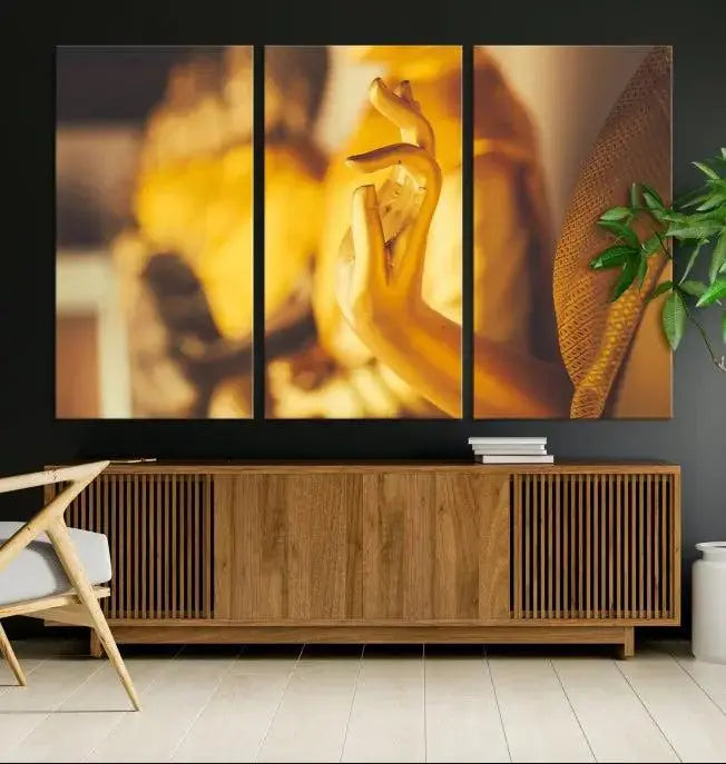 The wall is adorned with the Gold Buddha Statue Hands Wall Art Canvas Print triptych, creating a serene atmosphere ideal for meditation room decor.