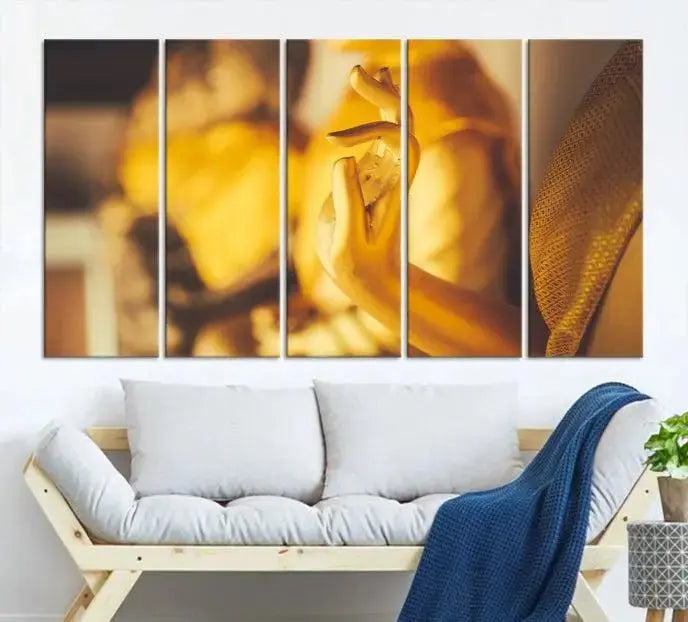 The wall is adorned with the Gold Buddha Statue Hands Wall Art Canvas Print triptych, creating a serene atmosphere ideal for meditation room decor.