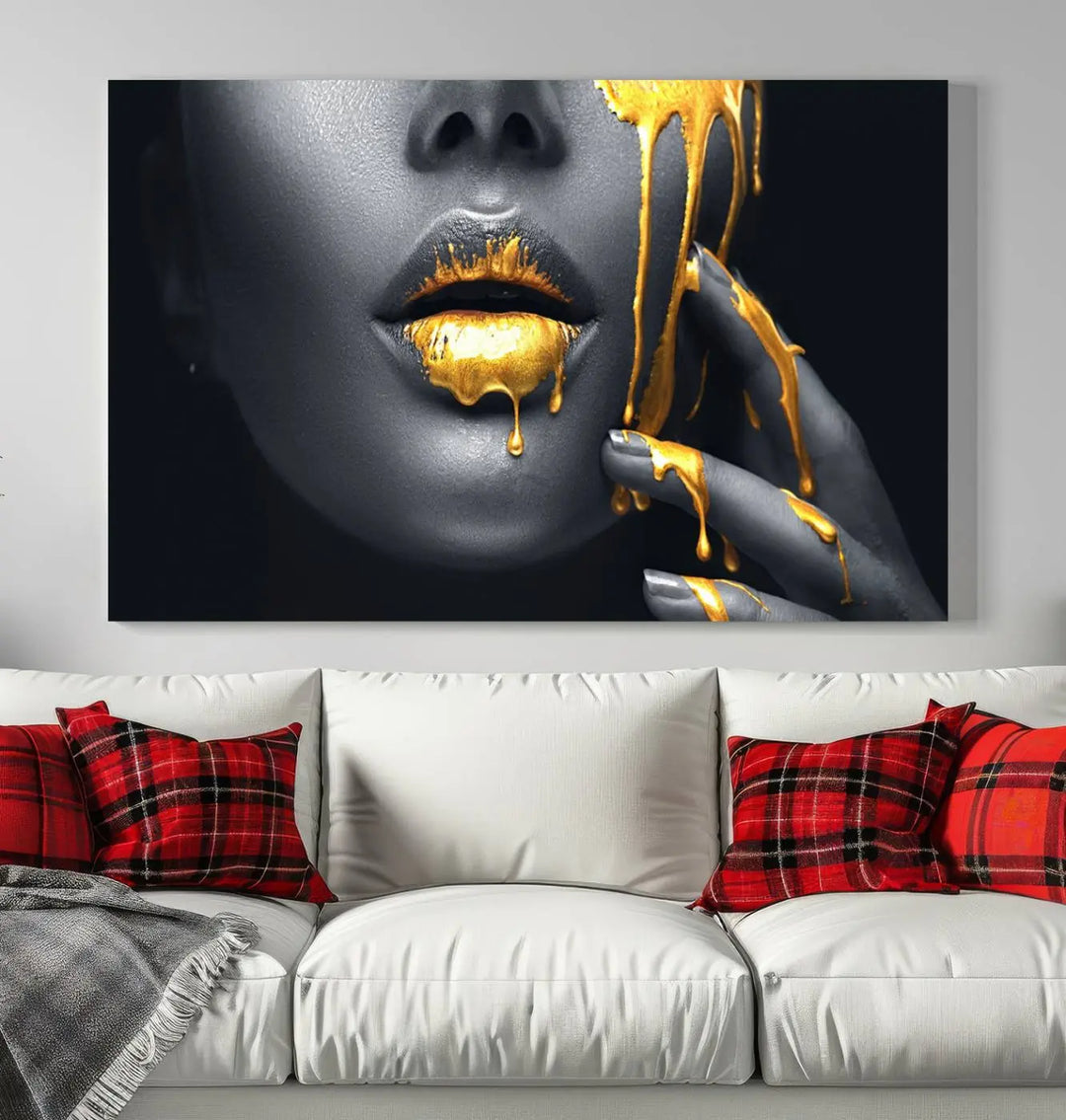 The modern living room features a striking triptych called the "Gold Glitter Lips Fashion Photography Wall Art Makeup" canvas print.