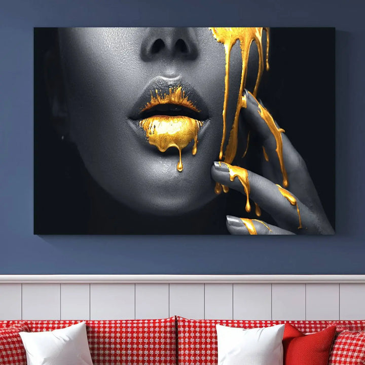 The modern living room features a striking triptych called the "Gold Glitter Lips Fashion Photography Wall Art Makeup" canvas print.