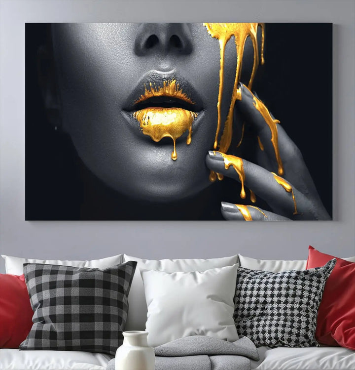 The modern living room features a striking triptych called the "Gold Glitter Lips Fashion Photography Wall Art Makeup" canvas print.