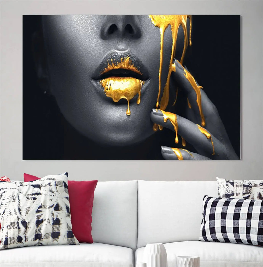 The modern living room features a striking triptych called the "Gold Glitter Lips Fashion Photography Wall Art Makeup" canvas print.