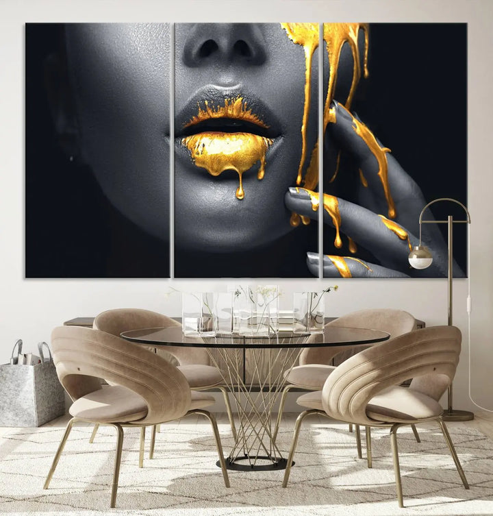 The modern living room features a striking triptych called the "Gold Glitter Lips Fashion Photography Wall Art Makeup" canvas print.