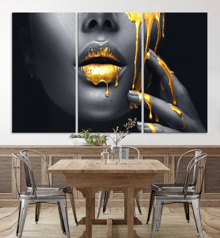 The modern living room features a striking triptych called the "Gold Glitter Lips Fashion Photography Wall Art Makeup" canvas print.