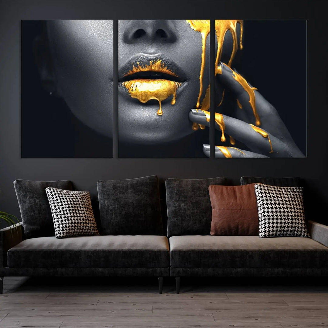 The modern living room features a striking triptych called the "Gold Glitter Lips Fashion Photography Wall Art Makeup" canvas print.