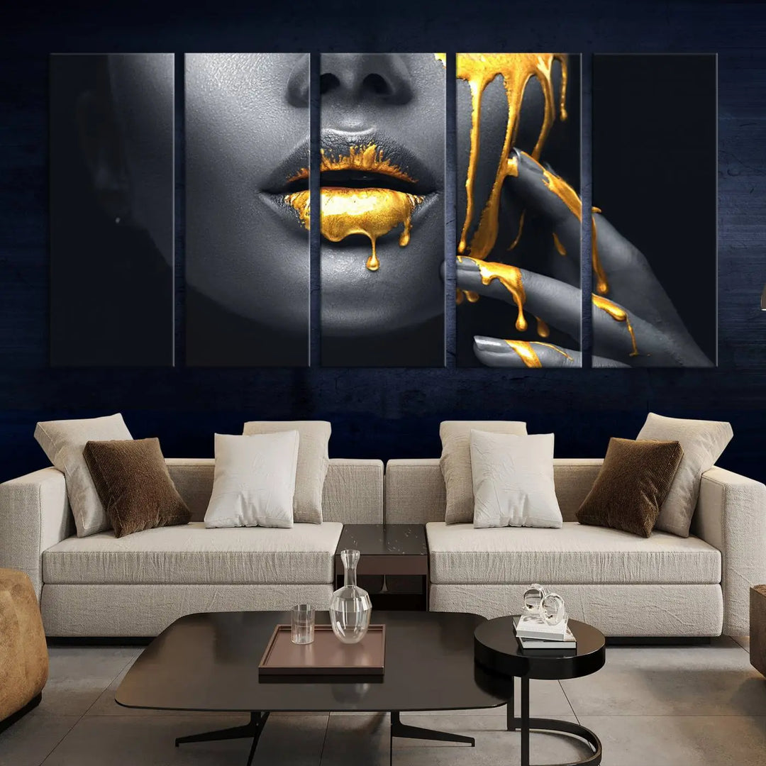 The modern living room features a striking triptych called the "Gold Glitter Lips Fashion Photography Wall Art Makeup" canvas print.