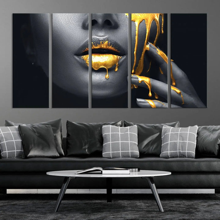 The modern living room features a striking triptych called the "Gold Glitter Lips Fashion Photography Wall Art Makeup" canvas print.