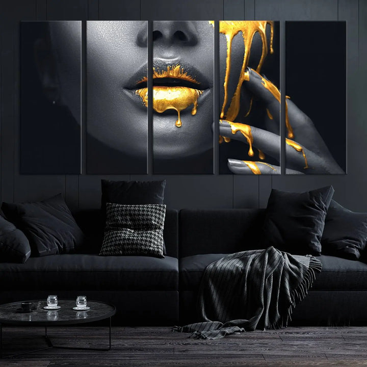 The modern living room features a striking triptych called the "Gold Glitter Lips Fashion Photography Wall Art Makeup" canvas print.