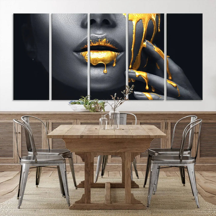 The modern living room features a striking triptych called the "Gold Glitter Lips Fashion Photography Wall Art Makeup" canvas print.