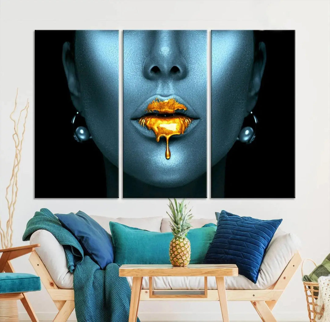 The wall showcases the Gold Glitter Lips Wall Art Lips Canvas Art Print, featuring a striking blue metallic face with gold glitter lips. This piece effortlessly incorporates modern aesthetics into your living space.