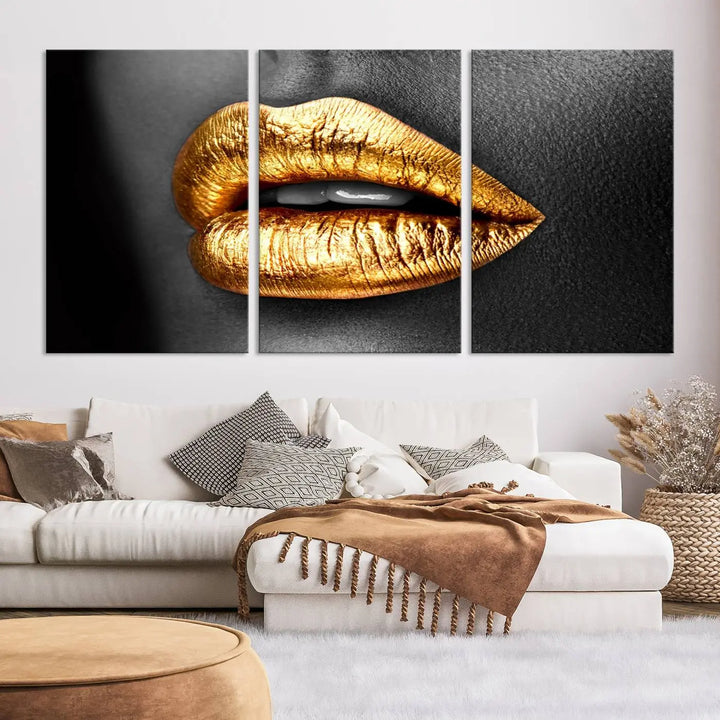 Immerse yourself in fashion-forward design with this stunning Gold Lips Canvas Wall Art Print. Perfectly positioned above a modern living room, it creates a chic and sophisticated oasis.