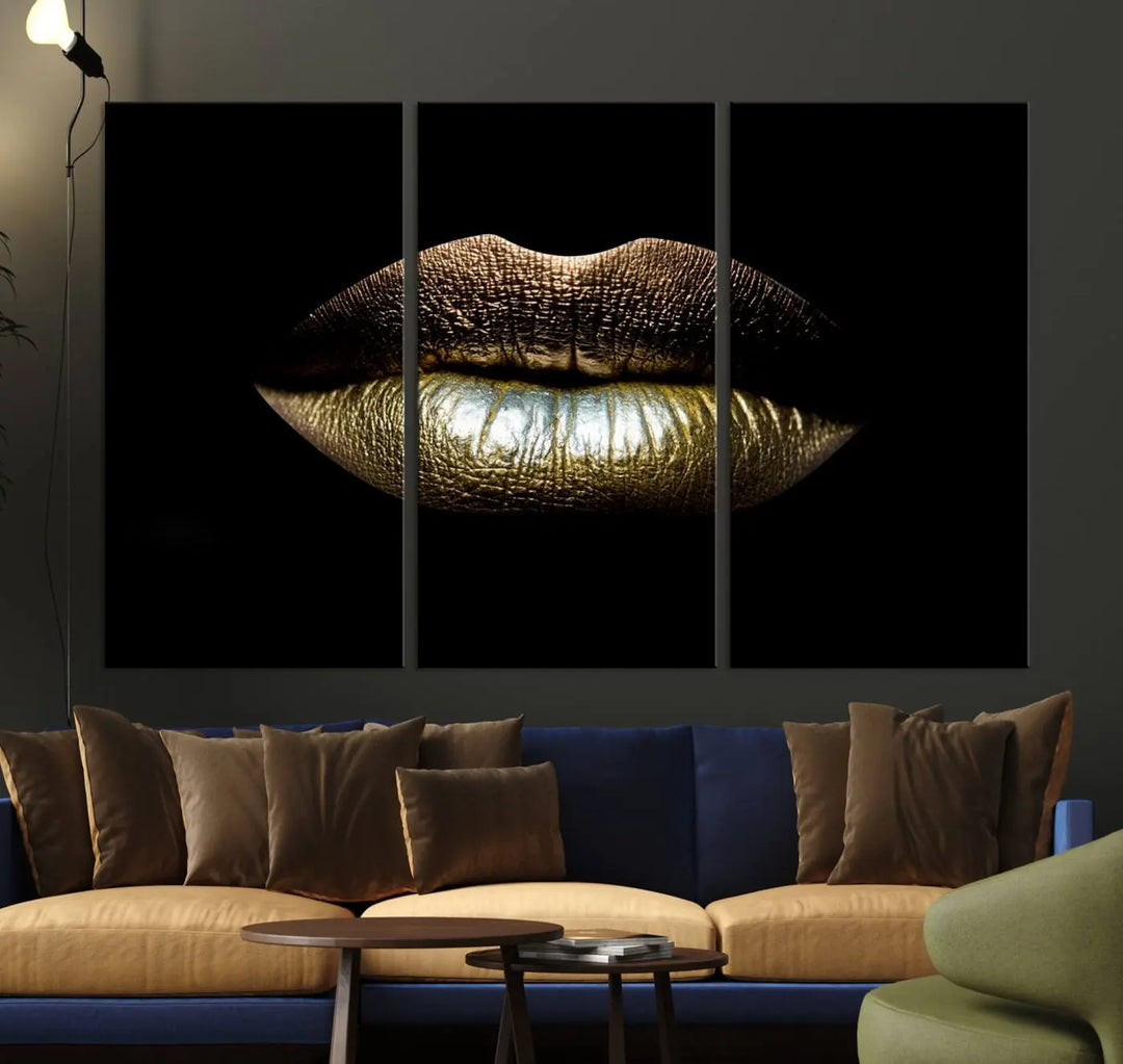 The contemporary living room is enhanced by the eye-catching Gold Lips Makeup Canvas Wall Art Fashion Beauty Canvas Print, presented in three panels.