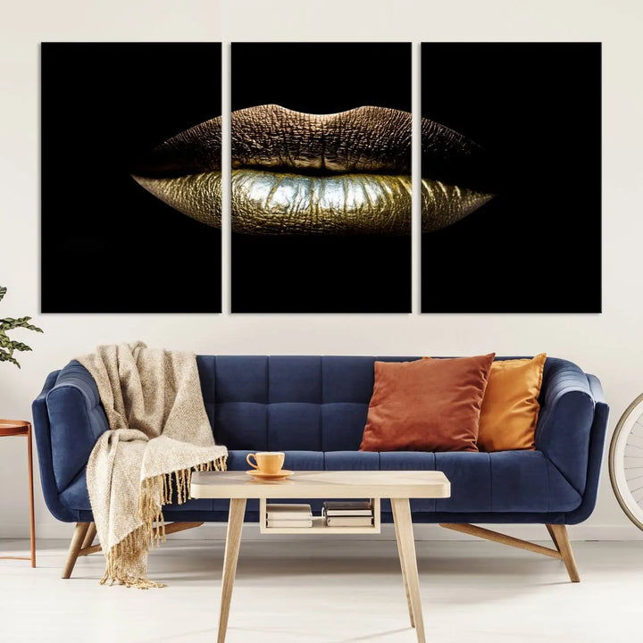 The contemporary living room is enhanced by the eye-catching Gold Lips Makeup Canvas Wall Art Fashion Beauty Canvas Print, presented in three panels.