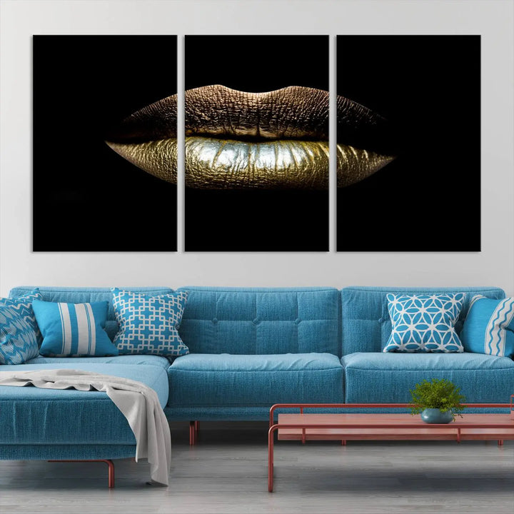 The contemporary living room is enhanced by the eye-catching Gold Lips Makeup Canvas Wall Art Fashion Beauty Canvas Print, presented in three panels.