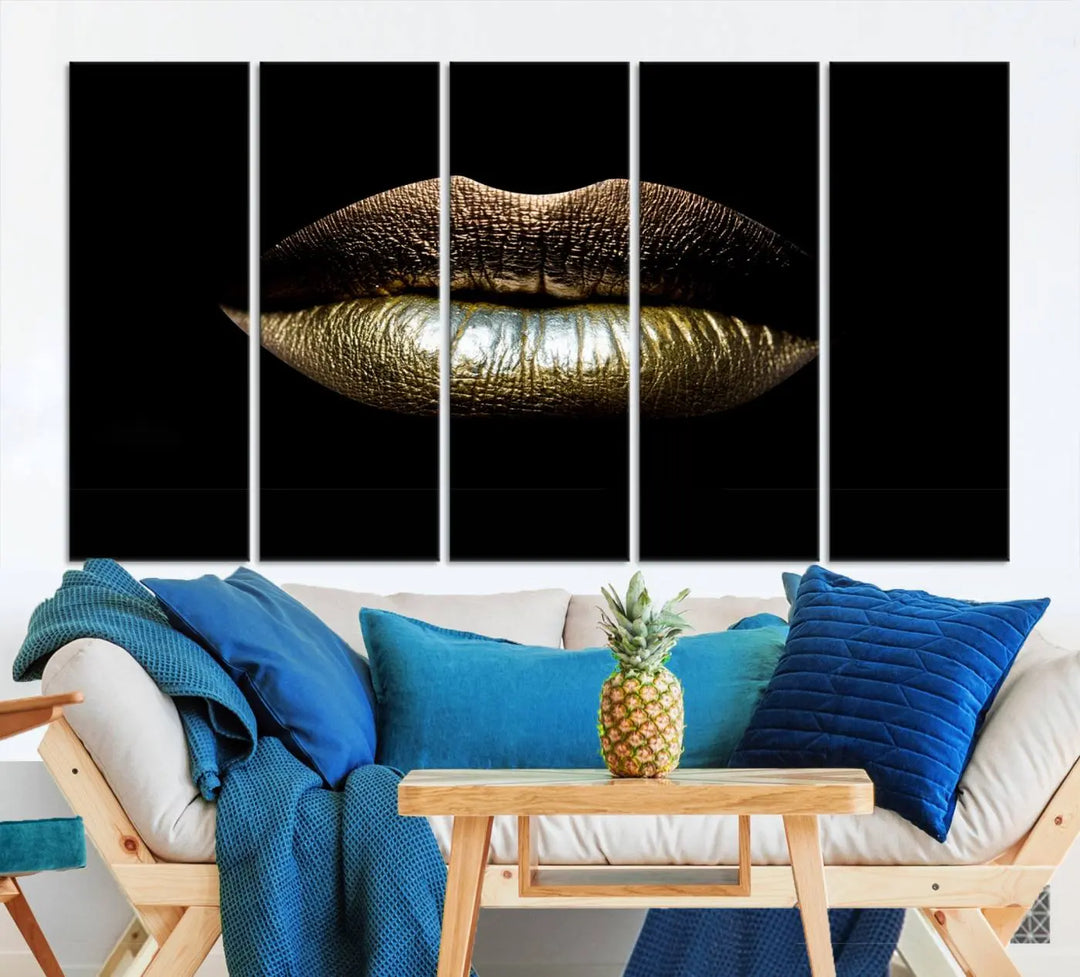 The contemporary living room is enhanced by the eye-catching Gold Lips Makeup Canvas Wall Art Fashion Beauty Canvas Print, presented in three panels.