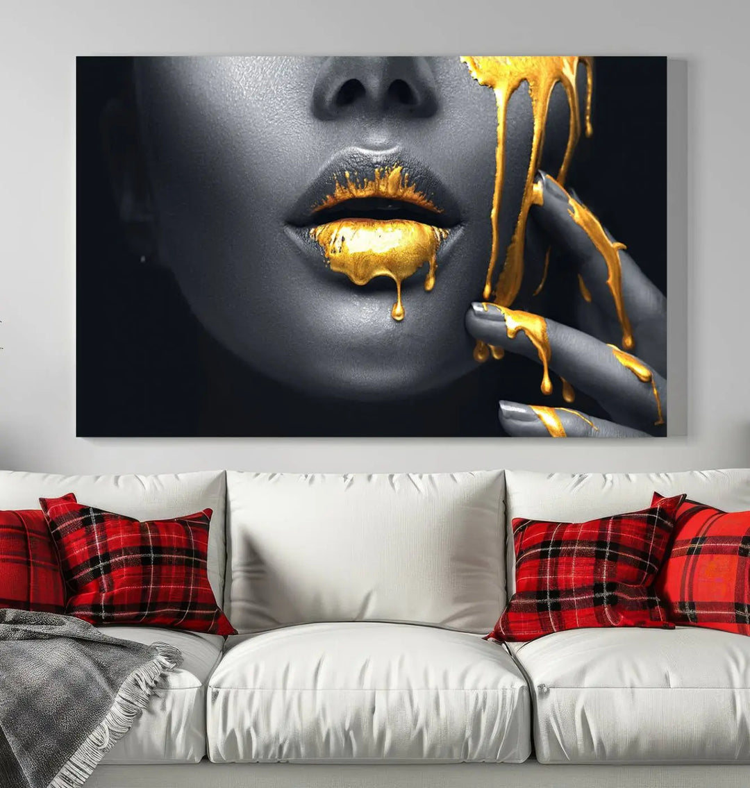 A modern living room featuring the "Gold Lips and Black Woman Makeup Canvas Print" adds a contemporary art style.