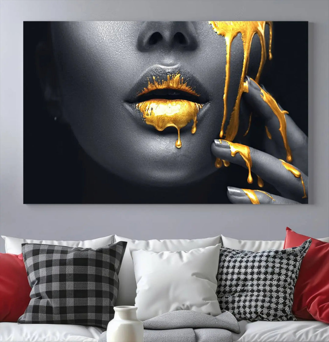 A modern living room featuring the "Gold Lips and Black Woman Makeup Canvas Print" adds a contemporary art style.