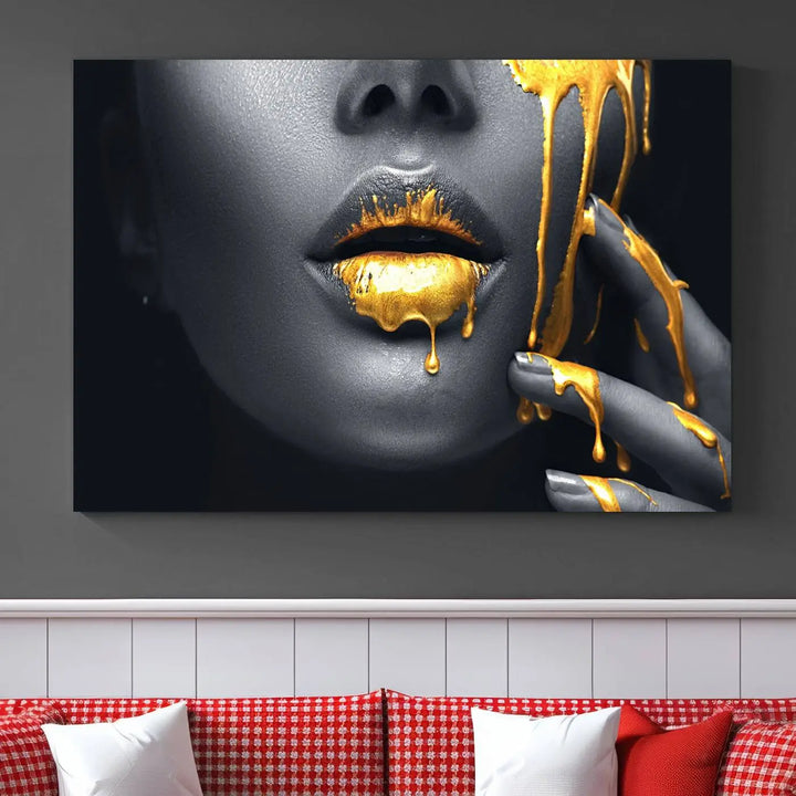 A modern living room featuring the "Gold Lips and Black Woman Makeup Canvas Print" adds a contemporary art style.