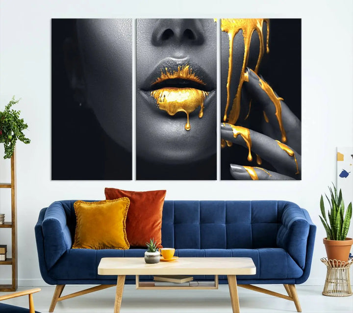 A modern living room featuring the "Gold Lips and Black Woman Makeup Canvas Print" adds a contemporary art style.