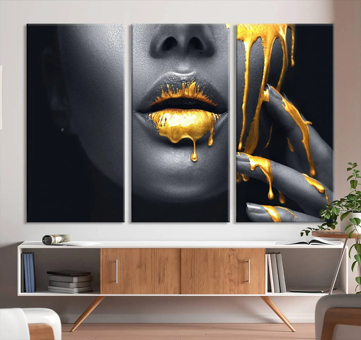 A modern living room featuring the "Gold Lips and Black Woman Makeup Canvas Print" adds a contemporary art style.