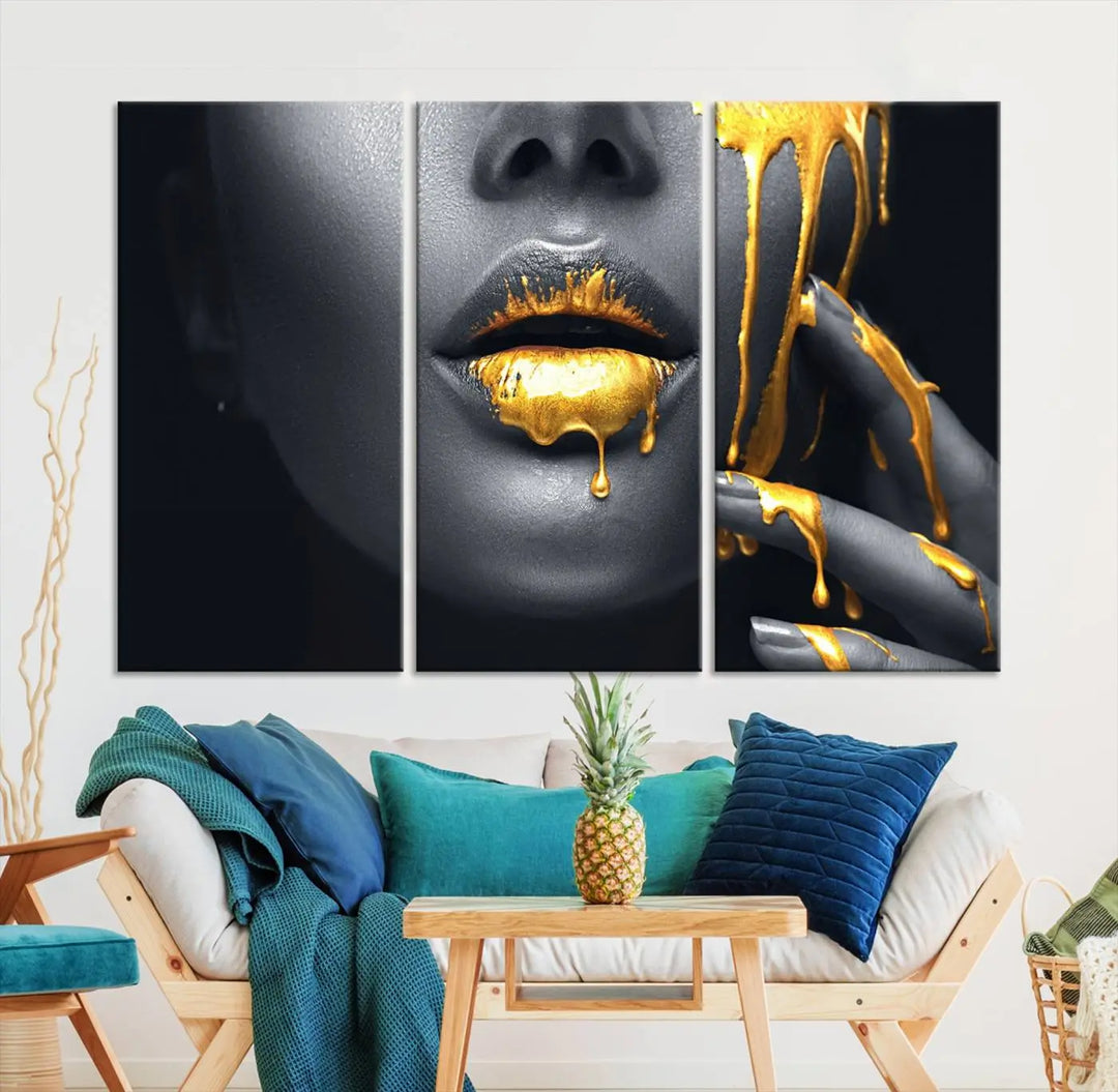 A modern living room featuring the "Gold Lips and Black Woman Makeup Canvas Print" adds a contemporary art style.