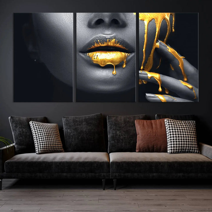 A modern living room featuring the "Gold Lips and Black Woman Makeup Canvas Print" adds a contemporary art style.