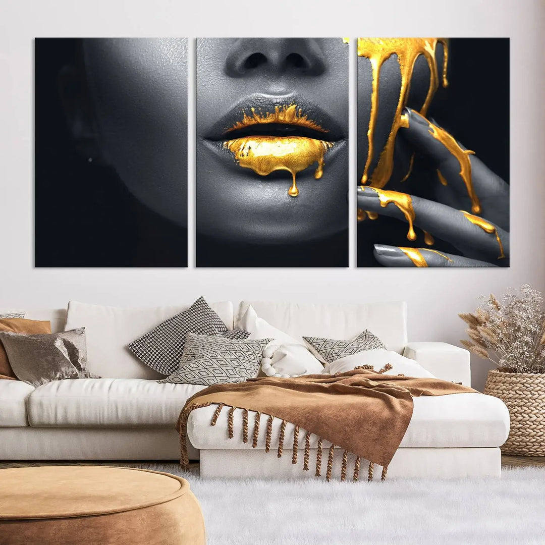 A modern living room featuring the "Gold Lips and Black Woman Makeup Canvas Print" adds a contemporary art style.