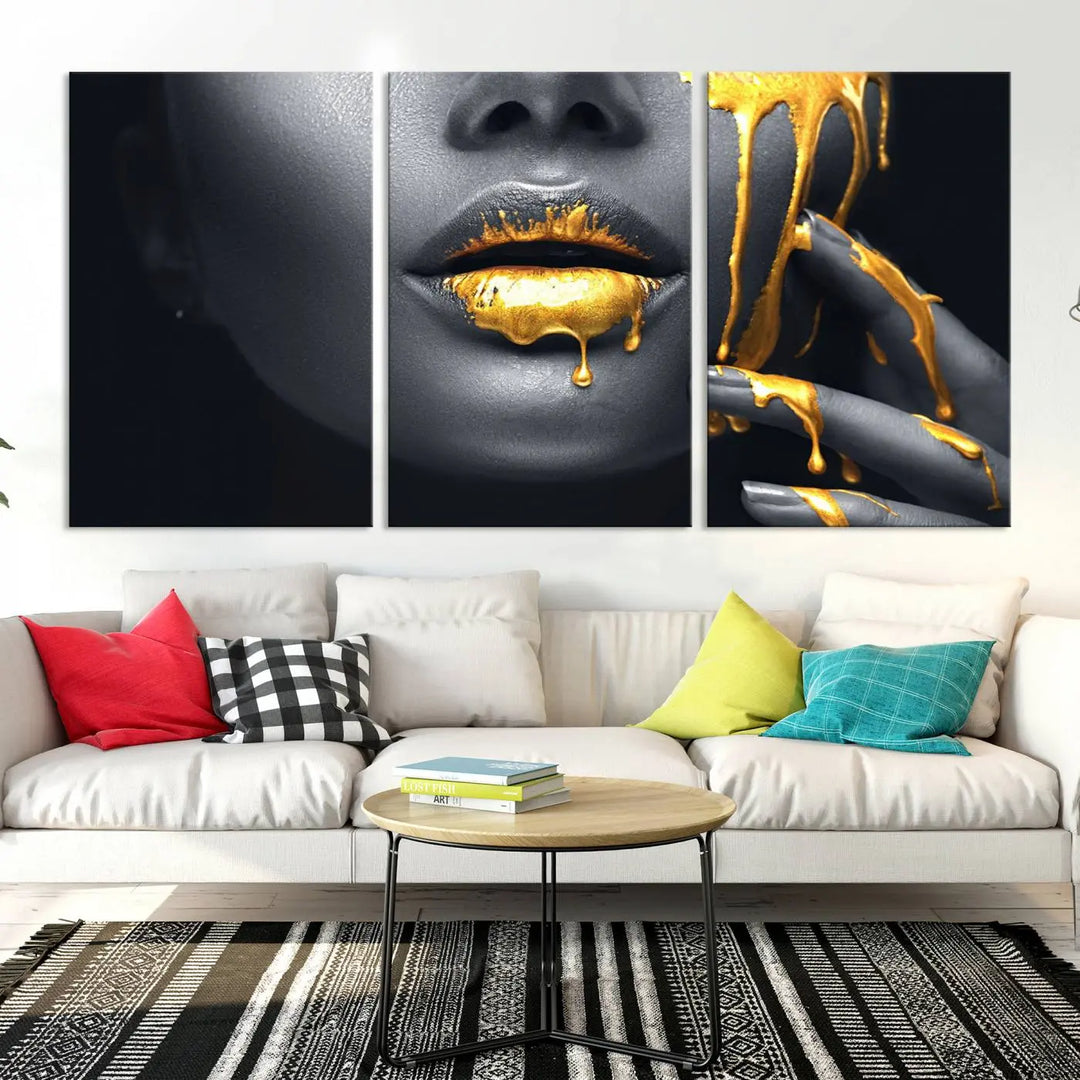 A modern living room featuring the "Gold Lips and Black Woman Makeup Canvas Print" adds a contemporary art style.