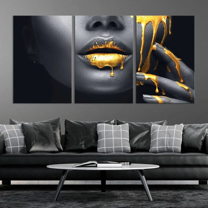 A modern living room featuring the "Gold Lips and Black Woman Makeup Canvas Print" adds a contemporary art style.