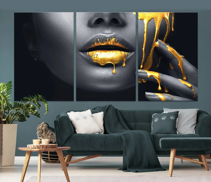 A modern living room featuring the "Gold Lips and Black Woman Makeup Canvas Print" adds a contemporary art style.