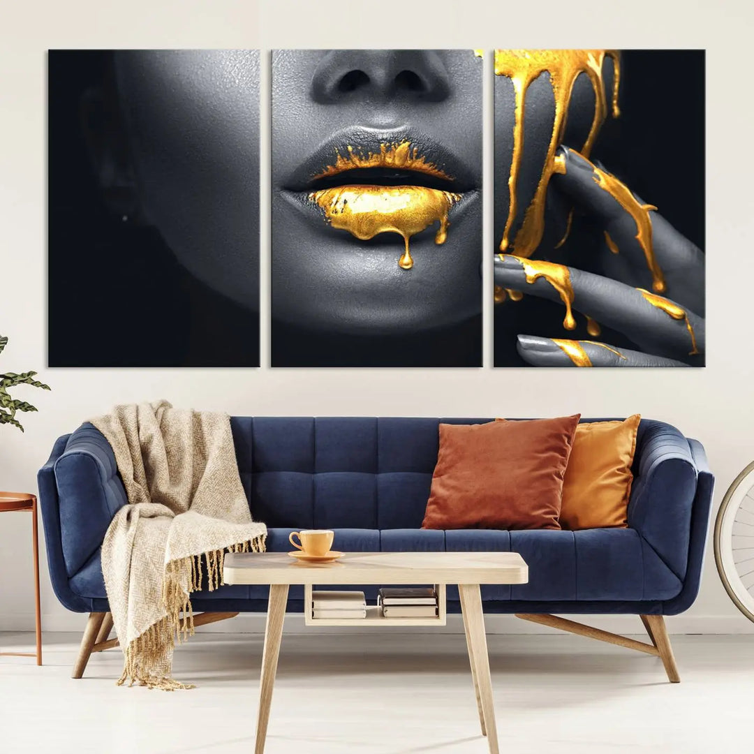 A modern living room featuring the "Gold Lips and Black Woman Makeup Canvas Print" adds a contemporary art style.