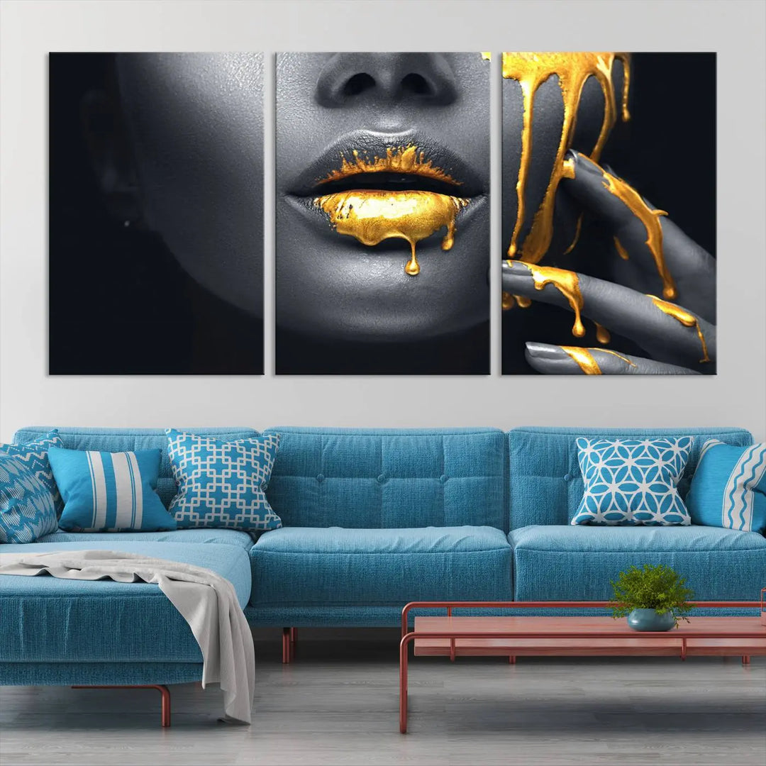 A modern living room featuring the "Gold Lips and Black Woman Makeup Canvas Print" adds a contemporary art style.