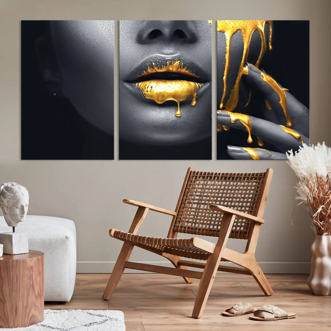 A modern living room featuring the "Gold Lips and Black Woman Makeup Canvas Print" adds a contemporary art style.