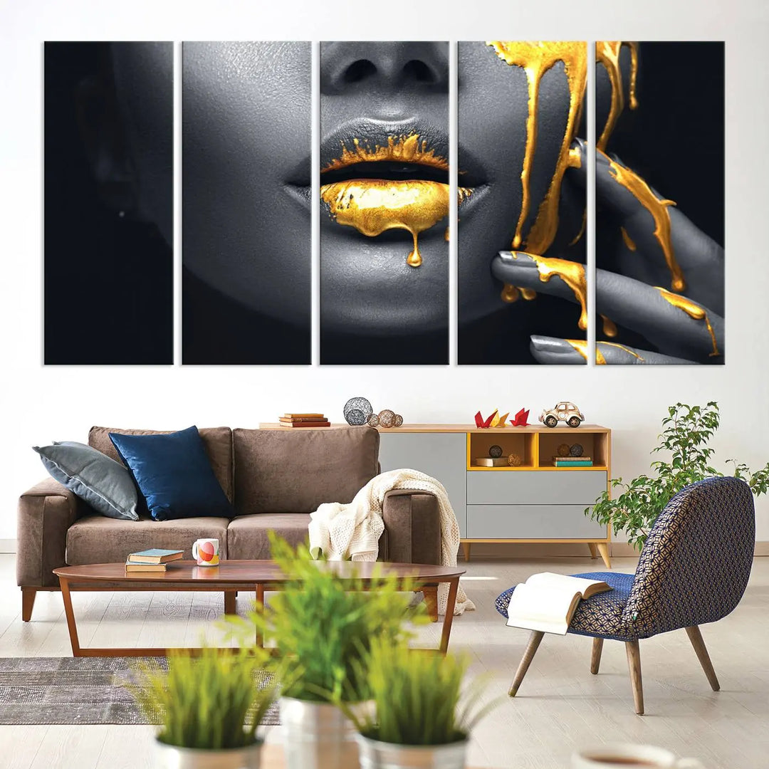 A modern living room featuring the "Gold Lips and Black Woman Makeup Canvas Print" adds a contemporary art style.