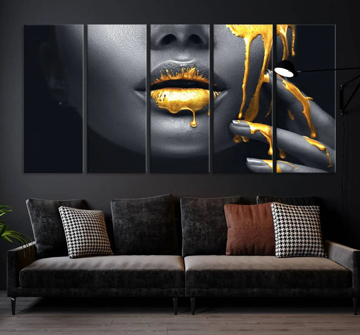 A modern living room featuring the "Gold Lips and Black Woman Makeup Canvas Print" adds a contemporary art style.