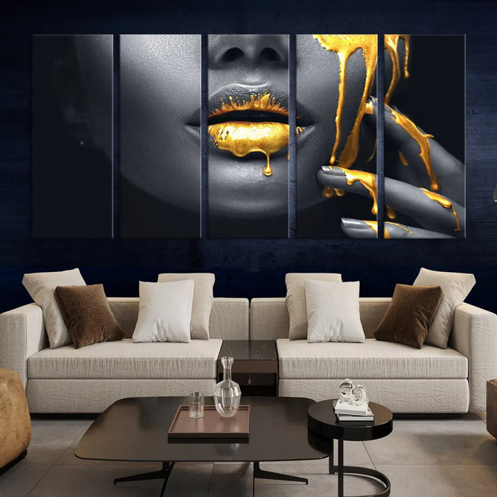 A modern living room featuring the "Gold Lips and Black Woman Makeup Canvas Print" adds a contemporary art style.