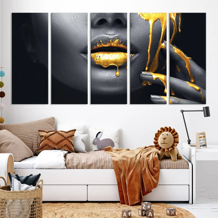 A modern living room featuring the "Gold Lips and Black Woman Makeup Canvas Print" adds a contemporary art style.