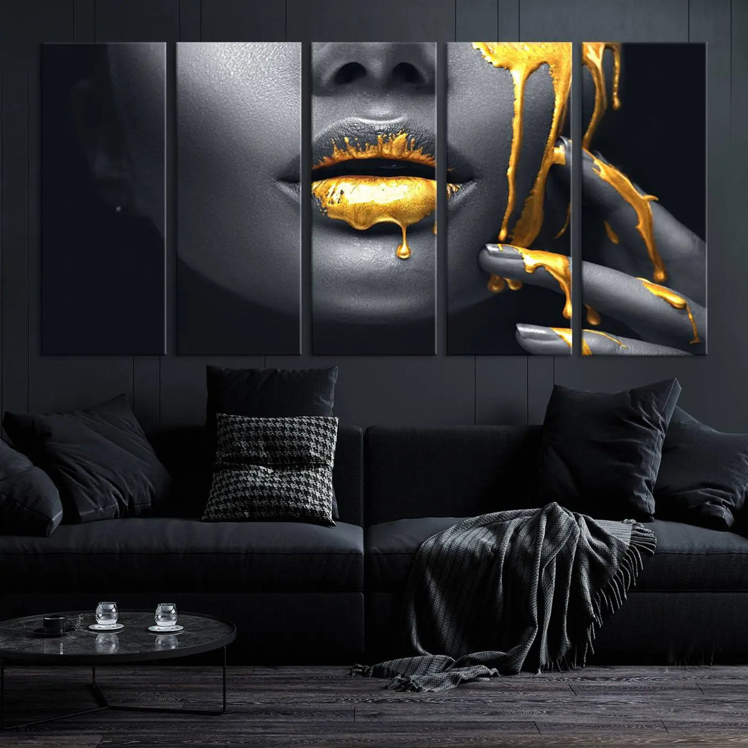 A modern living room featuring the "Gold Lips and Black Woman Makeup Canvas Print" adds a contemporary art style.