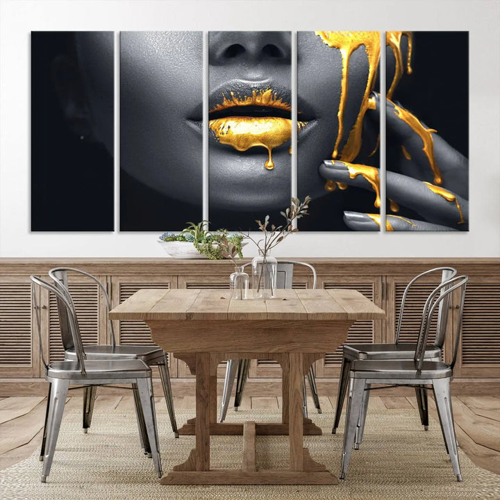 A modern living room featuring the "Gold Lips and Black Woman Makeup Canvas Print" adds a contemporary art style.