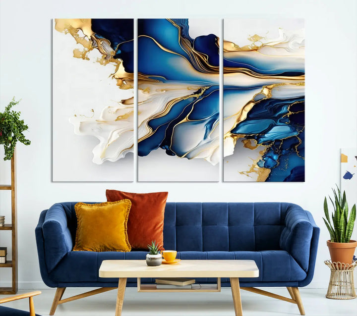 The Gold Marble Art - Abstract Geode Gold And Blue Marble Shape 3 Pieces Wall Art Canvas Print effortlessly complements abstract blue and gold decor.