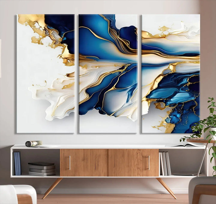 The Gold Marble Art - Abstract Geode Gold And Blue Marble Shape 3 Pieces Wall Art Canvas Print effortlessly complements abstract blue and gold decor.