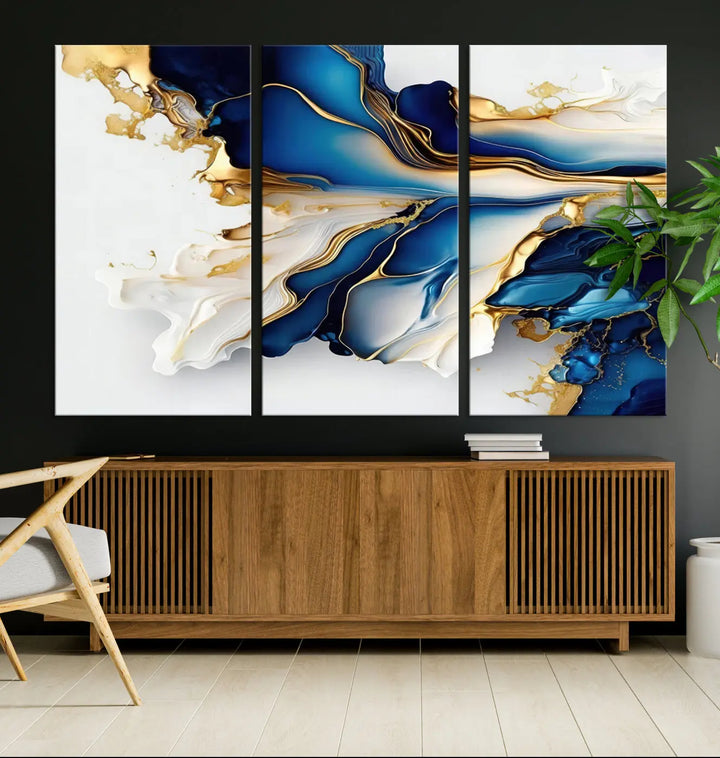 The Gold Marble Art - Abstract Geode Gold And Blue Marble Shape 3 Pieces Wall Art Canvas Print effortlessly complements abstract blue and gold decor.