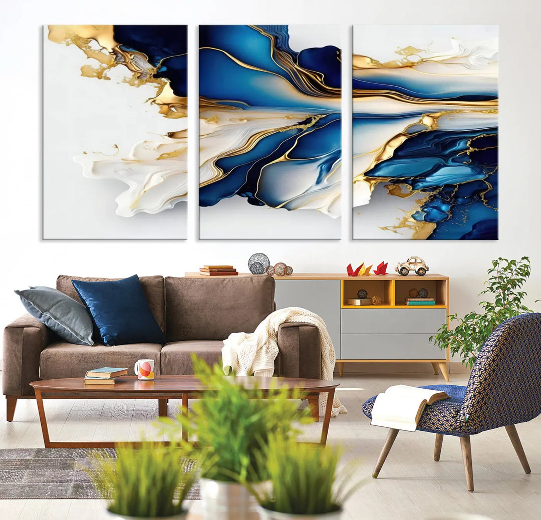 The Gold Marble Art - Abstract Geode Gold And Blue Marble Shape 3 Pieces Wall Art Canvas Print effortlessly complements abstract blue and gold decor.