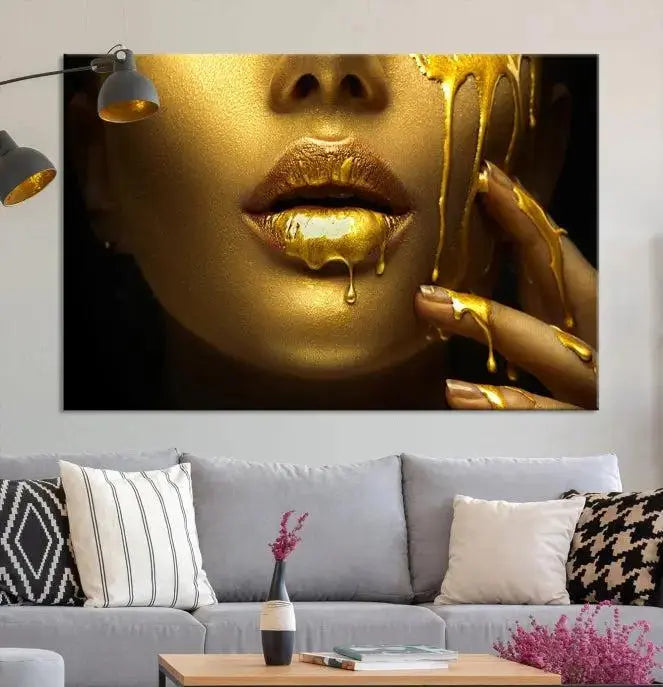 The Gold and Women Wall Art Canvas Print, with its exquisite golden depiction of a face and hand, elegantly adorns the space, bringing luxurious gold accents to this stylish living room.