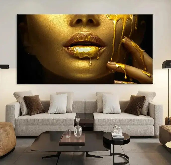 The Gold and Women Wall Art Canvas Print, with its exquisite golden depiction of a face and hand, elegantly adorns the space, bringing luxurious gold accents to this stylish living room.