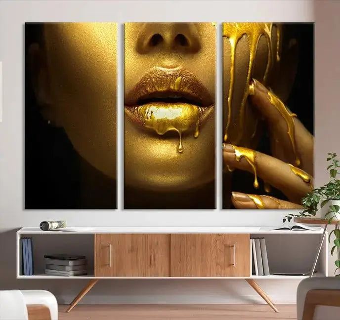 The Gold and Women Wall Art Canvas Print, with its exquisite golden depiction of a face and hand, elegantly adorns the space, bringing luxurious gold accents to this stylish living room.